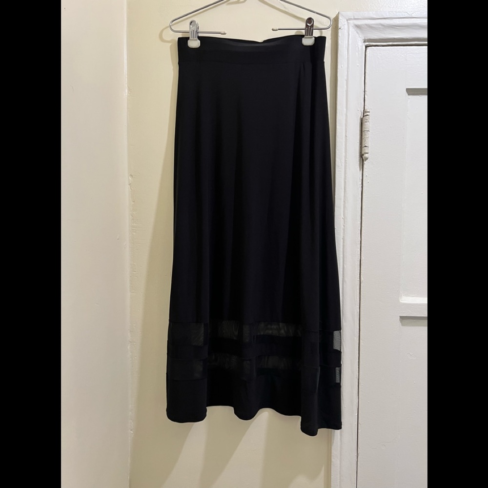 All black skirt, with sheer bottom, size L, gently worn